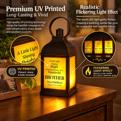 a lit up lantern sitting on top of a wooden table