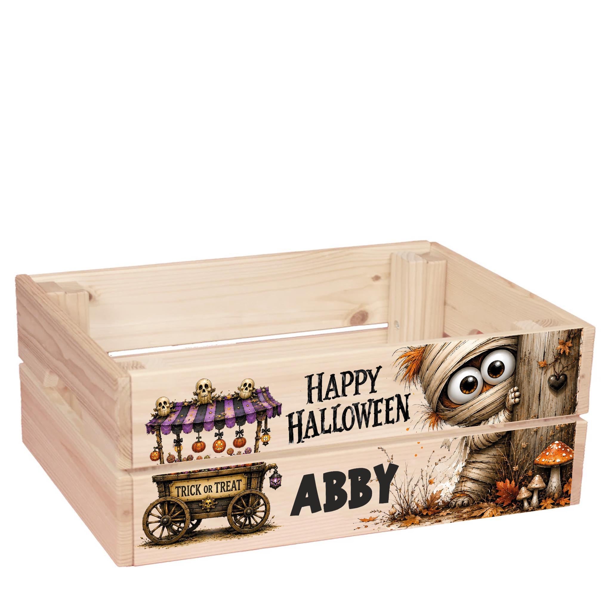 A wooden crate with a Halloween-themed design featuring a mummified character, a trick or treat wagon, and the text "Happy Halloween Abby".
