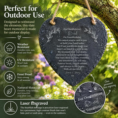 a heart shaped slate hanging from a tree