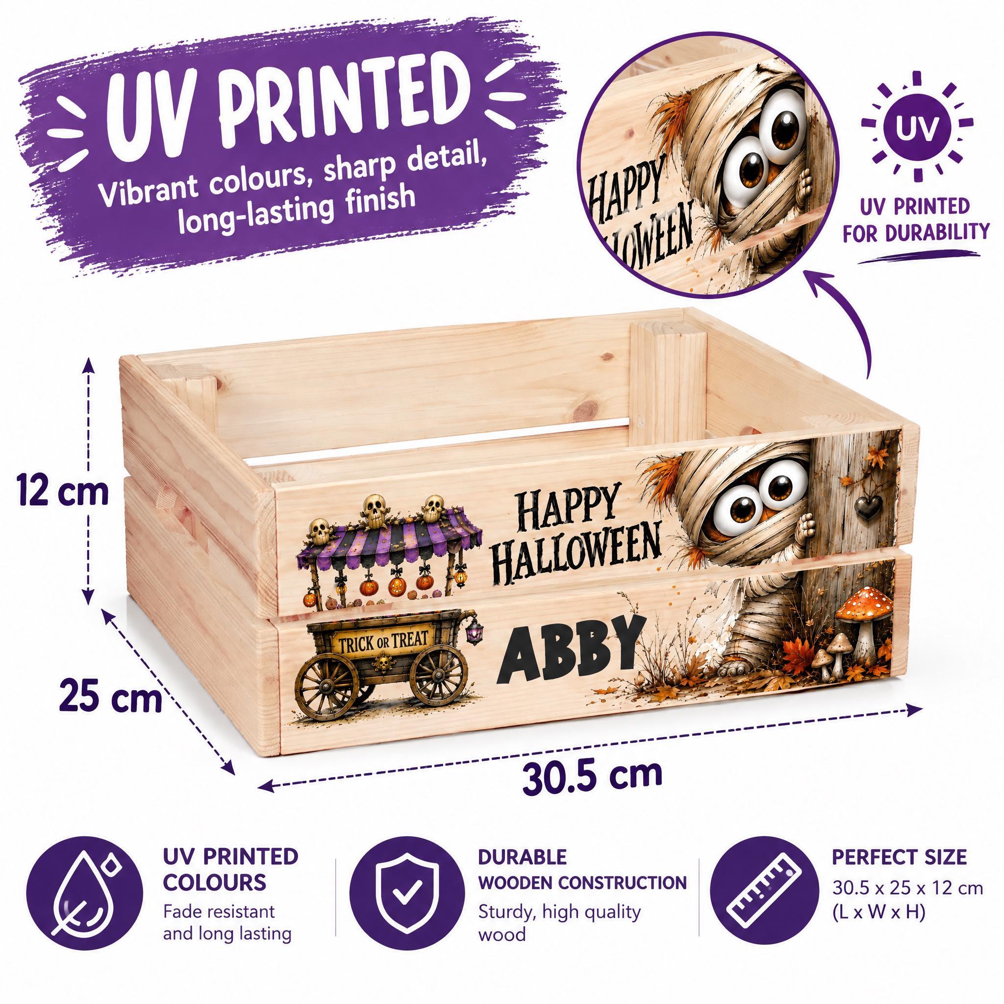 The image is an advertisement for a wooden crate with a Halloween theme. It features a wooden crate with a carved design and a carved face, along with a carved face and a carved pumpkin. The crate is described as UV printed, which means it has a durable finish and is water-resistant. The dimensions of the crate are 12 cm by 25 cm, and it is made of high-quality wood. The crate is also described as perfect in size, with a maximum length of 30.5 cm and a width of 25 cm.