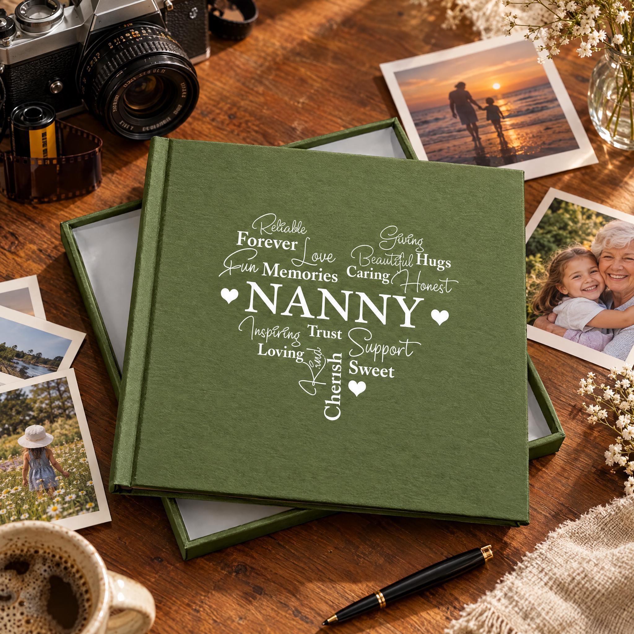 A green photo album with the word "NANNY" printed on it, surrounded by various photographs and a camera on a wooden surface.
