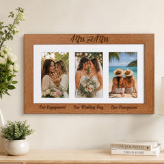 A wooden picture frame with three photographs of people, including a bride and two women, is displayed on a wall.