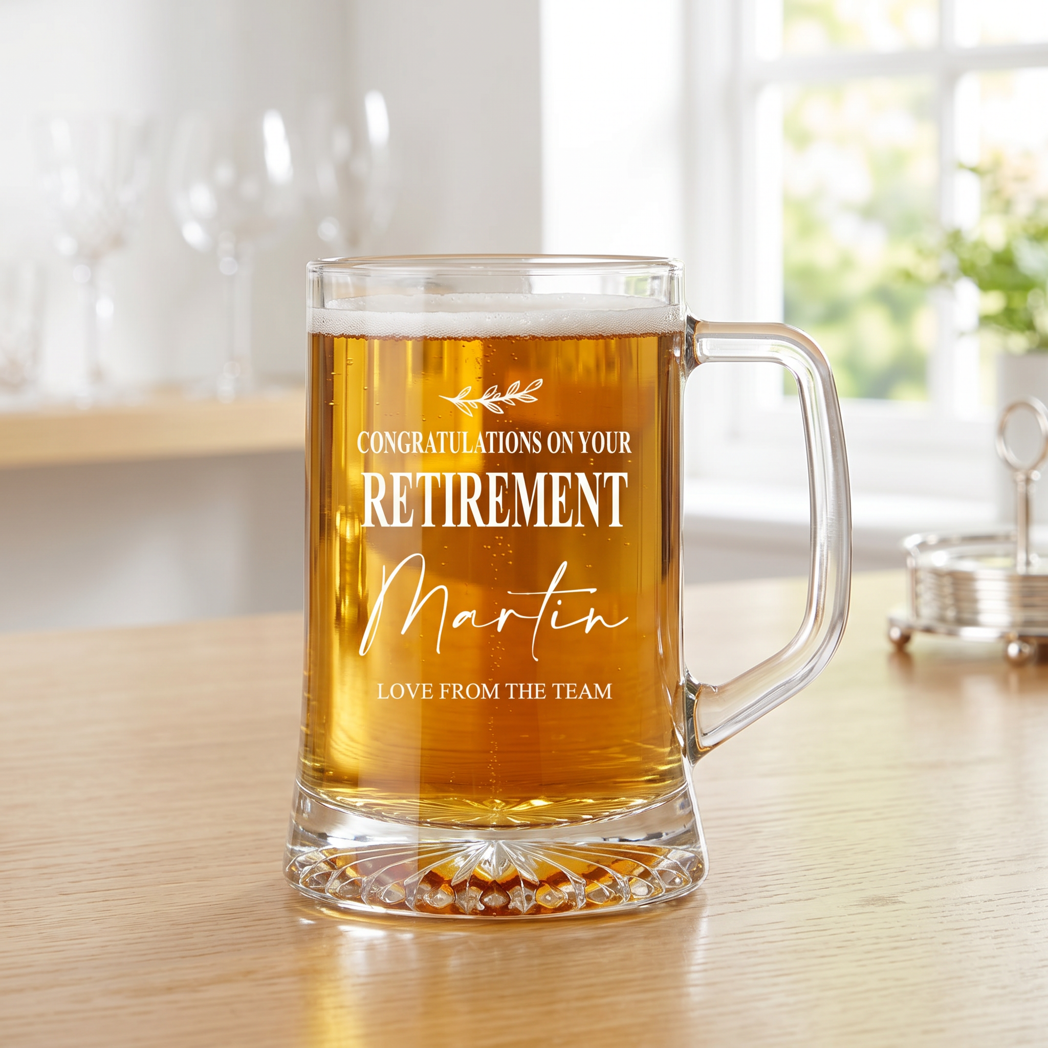 A glass mug filled with beer, placed on a wooden table, with a personalized message printed on it.