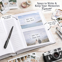 a notebook with a pen, a camera, and various photographs and notes on a wooden surface.