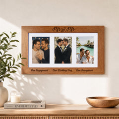 a wooden picture frame with three photographs of two men, one in a suit and the other in casual attire, and the text "Our Engagement, Our Wedding Day, Our Honeymoon" written on the frame.